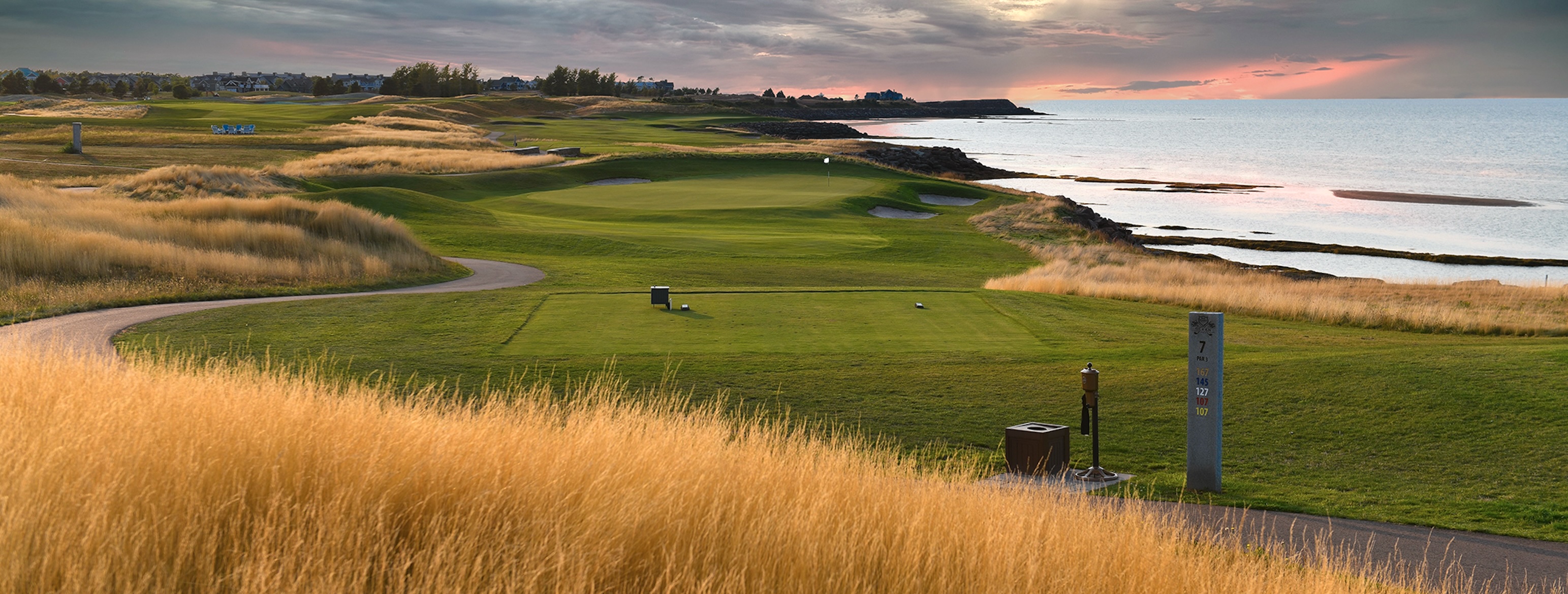 Par 3 hole at Fox Harb'r — marsh grass and the Northumberland Strait