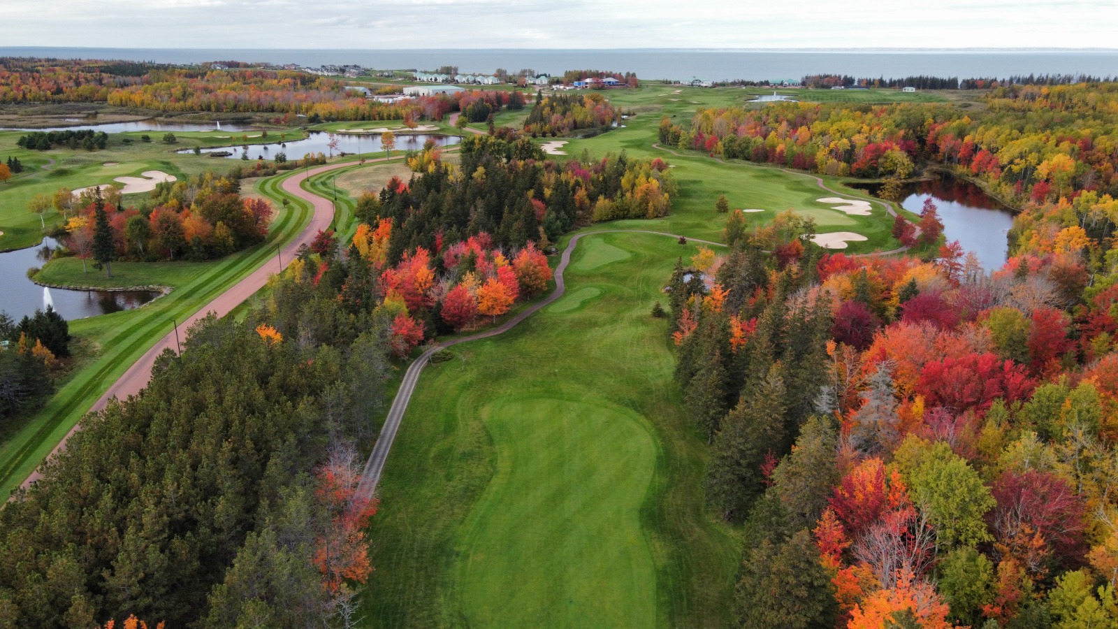 Fox Harb'r Resort &mdash; the new 18-hole course in peak fall colour, Northumberland Strait beyond